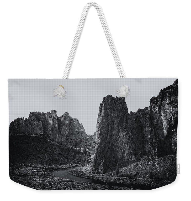 Smith Rock Weekender Tote Bag featuring the photograph River and Rock bw by Belinda Greb