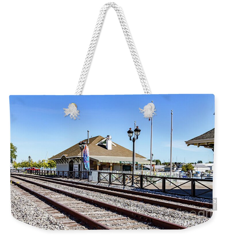 Rail Weekender Tote Bag featuring the photograph River Front Dining by William Norton