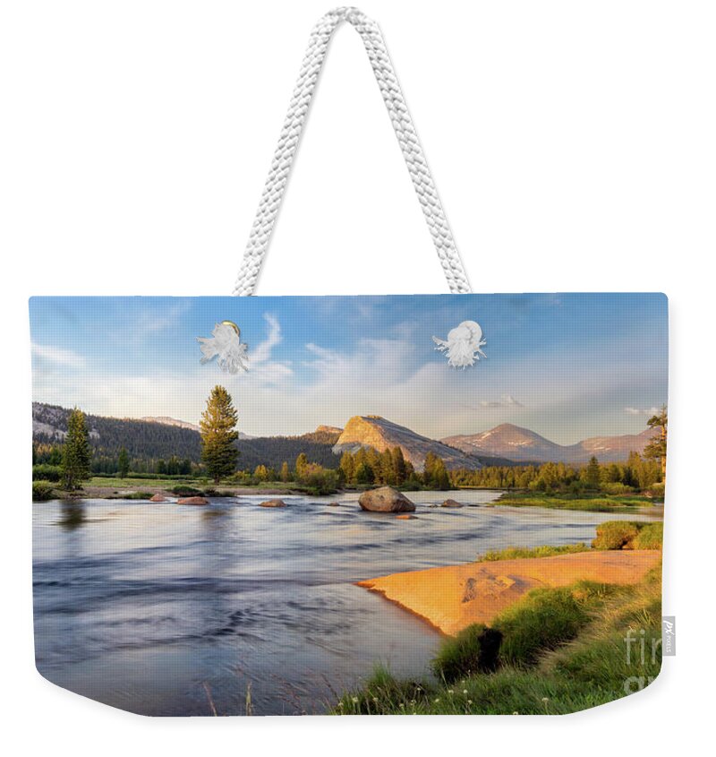 Grass Weekender Tote Bag featuring the photograph River Sunset by Brandon Bonafede