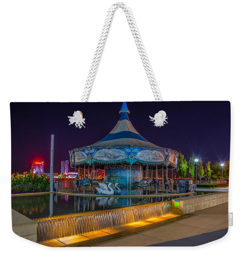 Carousel Weekender Tote Bag featuring the photograph Riverwalk Carousel by Pravin Sitaraman