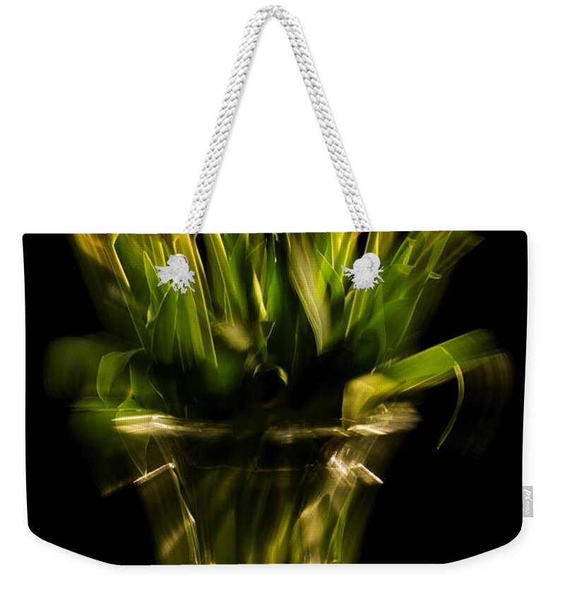 Photography Weekender Tote Bag featuring the photograph Rocket Propelled Tulips by Frederic A Reinecke