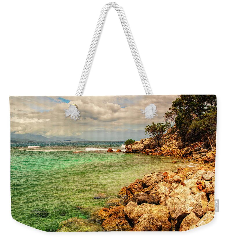 Labadee Weekender Tote Bag featuring the photograph Rocky Coast by Mick Burkey