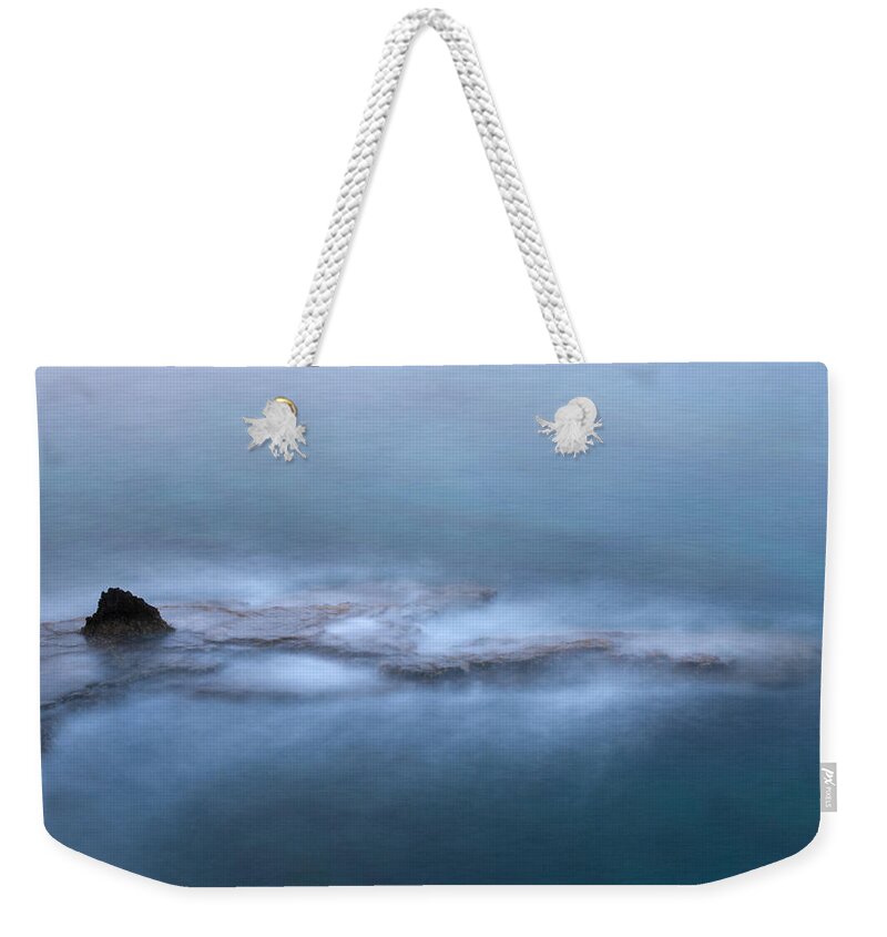 Abstract Weekender Tote Bag featuring the photograph Rocky coast seascape by Michalakis Ppalis