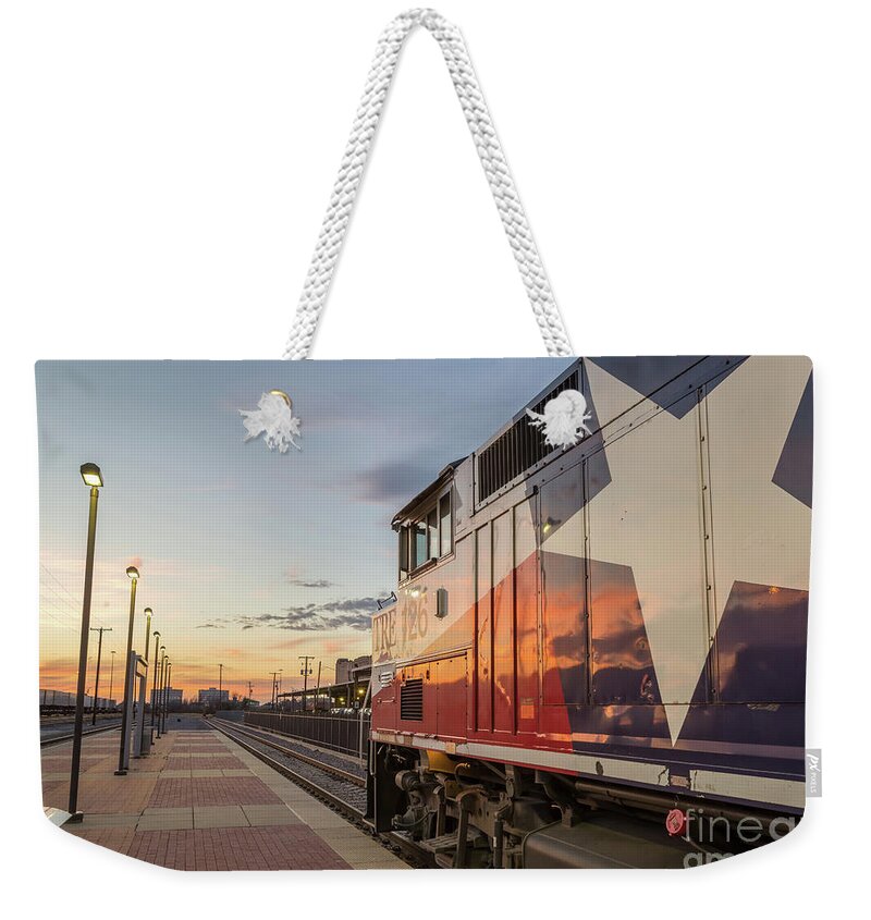 Fort Worth Weekender Tote Bag featuring the photograph Rolling into the sunset by Paul Quinn