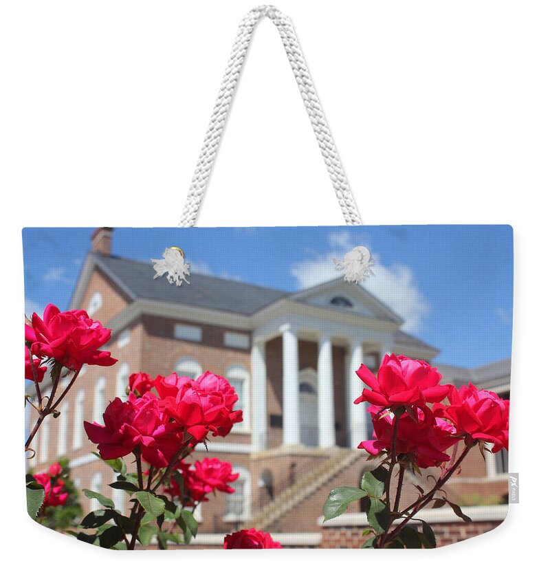 Lancaster Weekender Tote Bag featuring the photograph Roses at the Court House 2 by Joseph C Hinson
