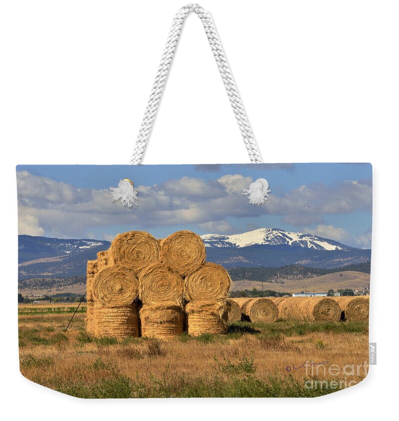 Hay Bales Weekender Tote Bag featuring the photograph Round Hay Bales and Mountain by Kae Cheatham
