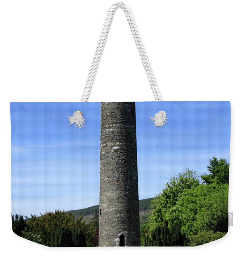 Ireland Weekender Tote Bag featuring the photograph Round Tower At Glendalough by Aidan Moran