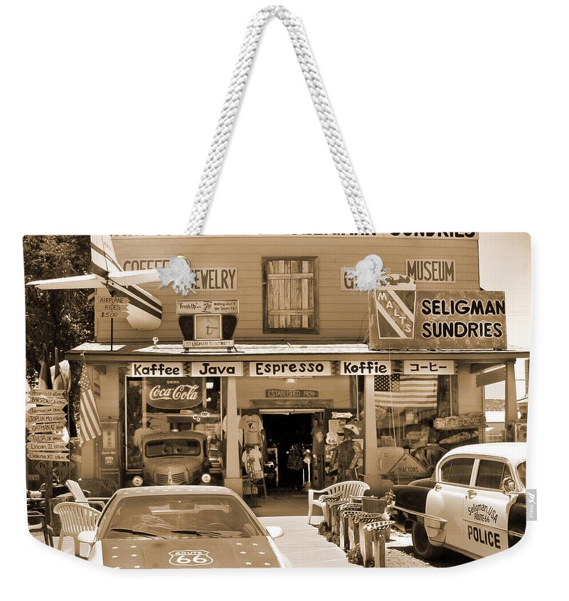 Plane Weekender Tote Bag featuring the photograph Route 66 - Historic Sundries by Mike McGlothlen