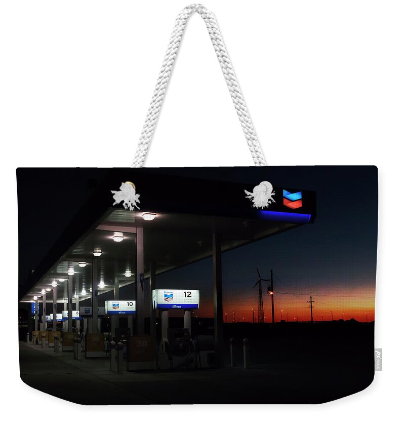 Filling Station Weekender Tote Bag featuring the photograph Running, to make the day last a little longer by Micah Offman