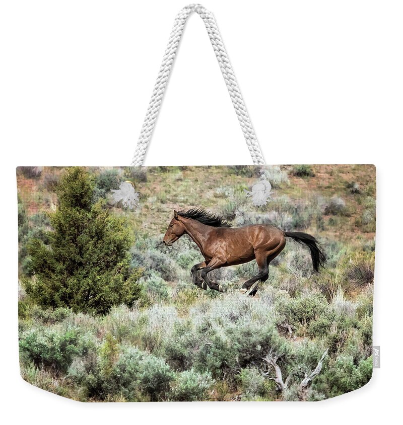 Wild Horses Weekender Tote Bag featuring the photograph Running Through Sage by Belinda Greb