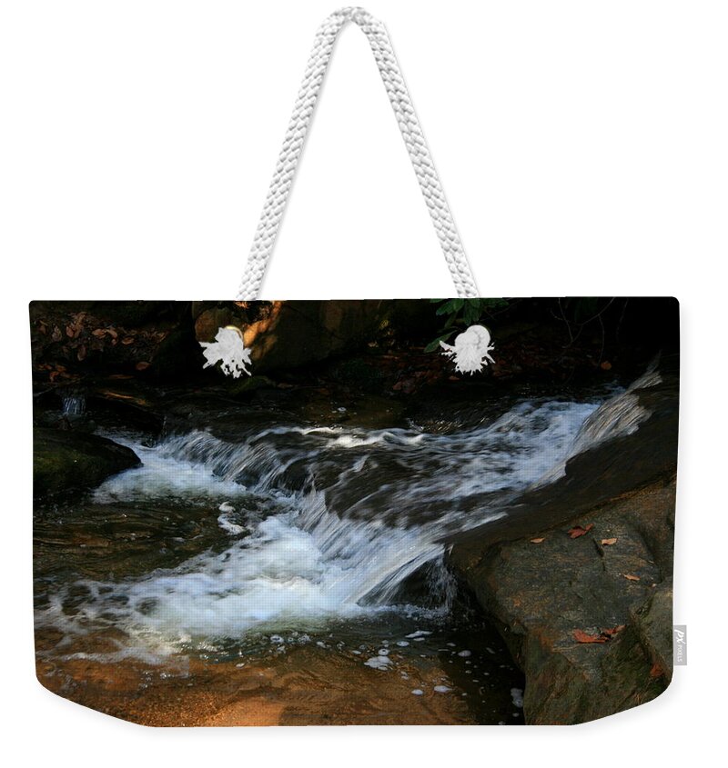 Water Weekender Tote Bag featuring the photograph Rushing water by Cathy Harper