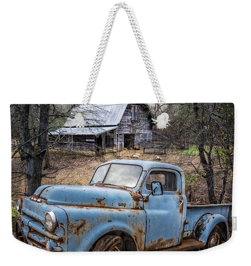 1950s Weekender Tote Bag featuring the photograph Rusty Blue Dodge by Debra and Dave Vanderlaan