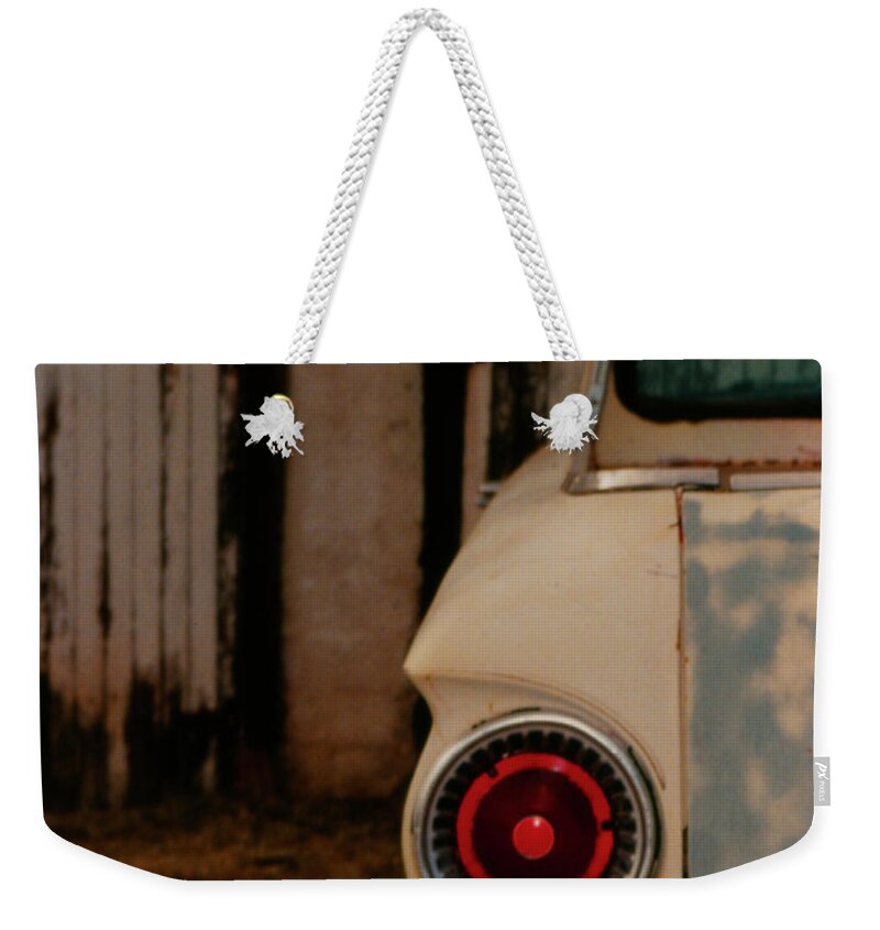  Weekender Tote Bag featuring the photograph Rusty Car by Heather Kirk