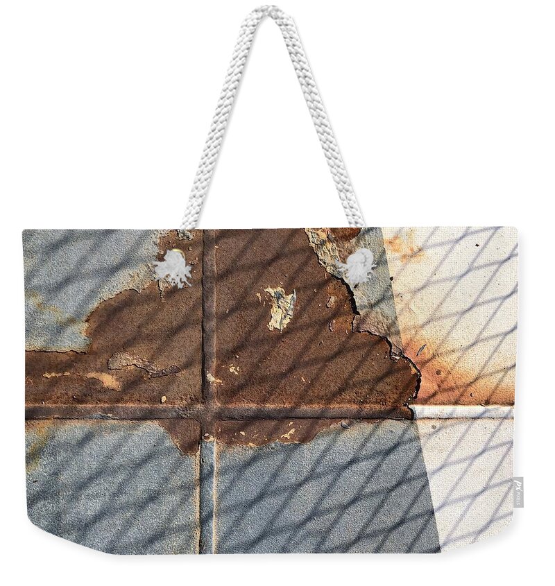 Rusty Floor Weekender Tote Bag featuring the photograph Rusty Cross by Flavia Westerwelle