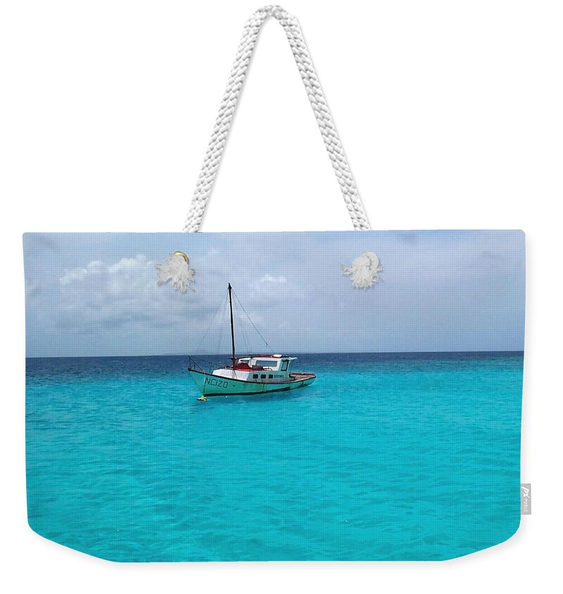 Sailboat Weekender Tote Bag featuring the photograph Sailboat Drifting in the Caribbean Azure Sea by Amy McDaniel