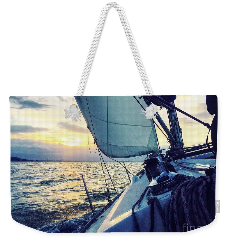 Sunset Weekender Tote Bag featuring the photograph Sailing Into The Sunset by Phil Perkins