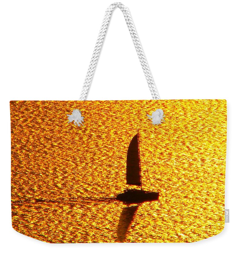 Water Weekender Tote Bag featuring the photograph Sailing On Gold by Ana Maria Edulescu