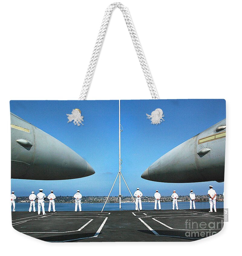 People Weekender Tote Bag featuring the photograph Sailors aboard the aircraft carrier USS Nimitz by Vintage Collectables
