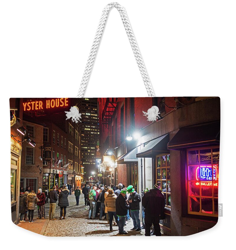 Boston Weekender Tote Bag featuring the photograph Saint Patrick's Day on Marshall Street Boston MA by Toby McGuire