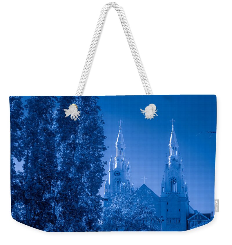 Bonnie Follett Weekender Tote Bag featuring the photograph Saints Peter and Paul Church in Blue by Bonnie Follett