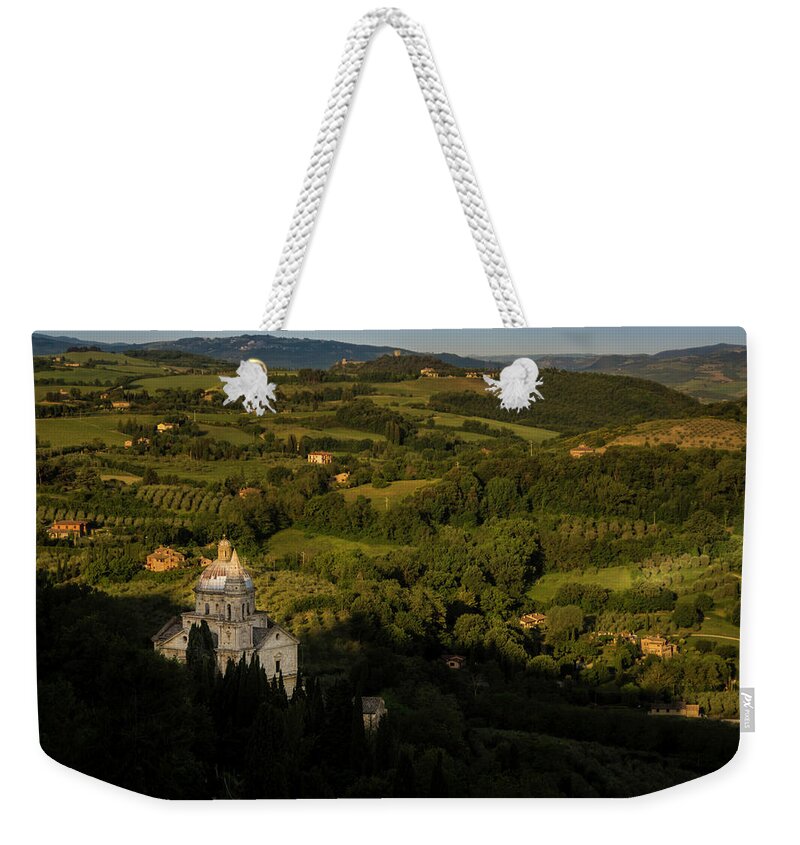 Tuscany Weekender Tote Bag featuring the photograph San Biagio at sunrise by Wolfgang Stocker