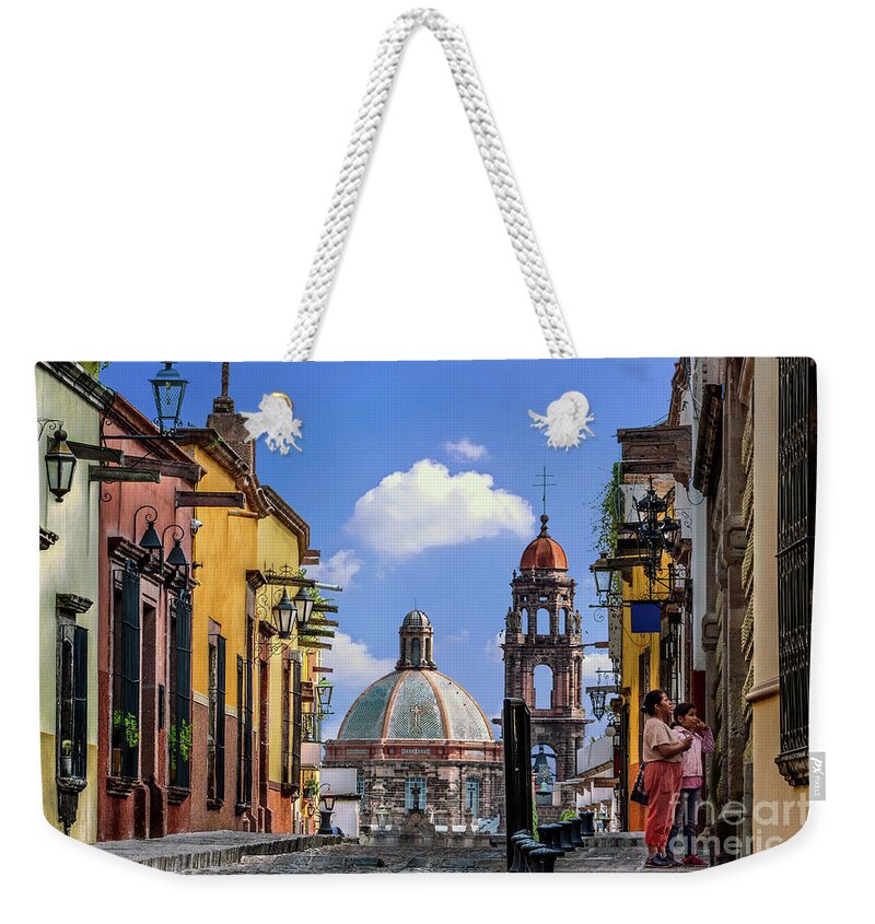 San Miguel Weekender Tote Bag featuring the photograph San Miguel Church Street by David Meznarich