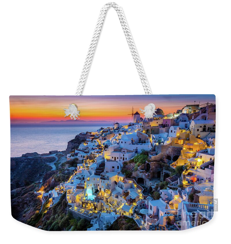 Aegean Sea Weekender Tote Bag featuring the photograph Santorini Sunset by Inge Johnsson