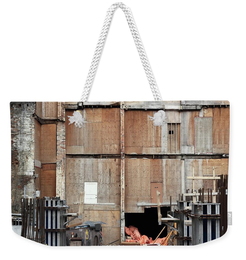 Urban Weekender Tote Bag featuring the photograph Saving Facade by Kreddible Trout