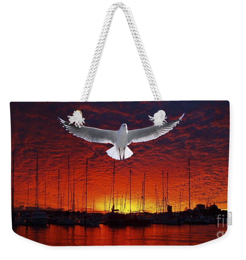 Crimson;seagull;marina;boats;bold;ocean Sunset; Sun; Dusk; Seascape Water Reflections; Photo Art;mooloolba;queensland; Australia; Misty Of Gosford; Beautiful Scene; Scenic Beauty; Landscape; Sky; Cloudscape; Coastal; Colourful Cloud; Nature;fire;stickers; Weekender Tote Bag featuring the photograph Scarlet Ocean Sunset. Original exclusive photo art. by Geoff Childs