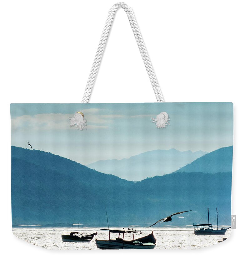Sea Weekender Tote Bag featuring the photograph Sea and Freedom by Martin Lopreiato
