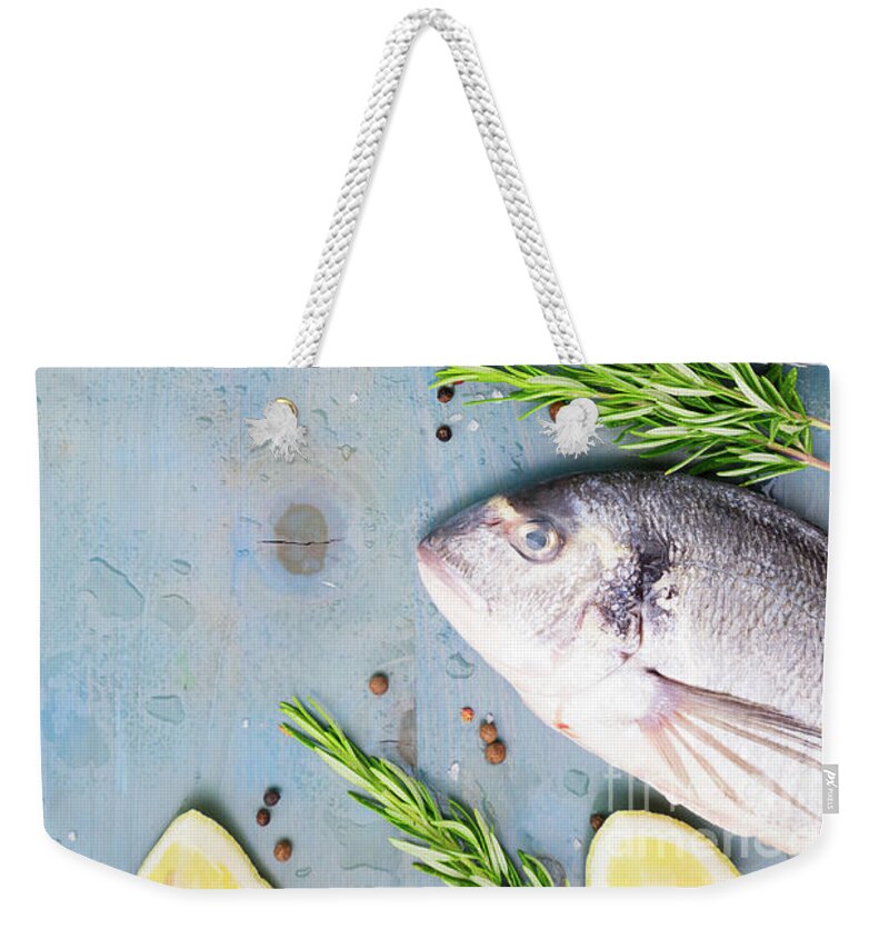 Fish Weekender Tote Bag featuring the photograph Sea Fish by Anastasy Yarmolovich
