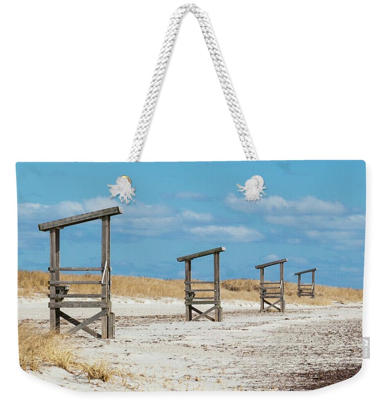 Seaside Sentinels Weekender Tote Bag featuring the photograph Seaside Sentinels by Michelle Constantine