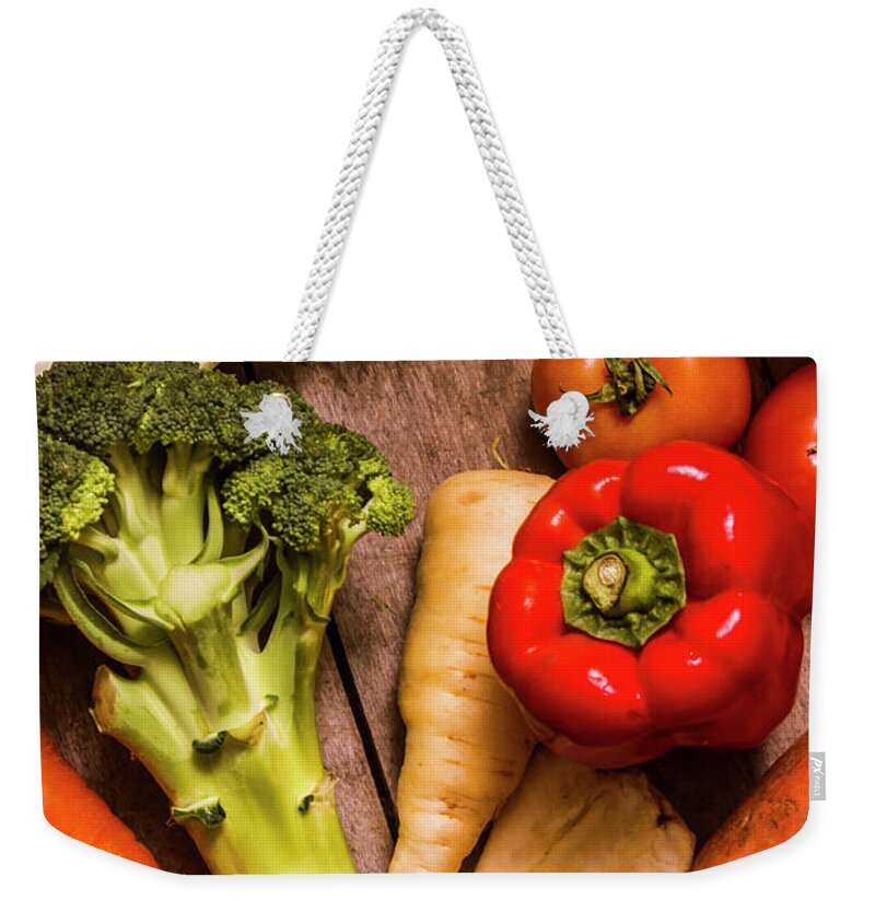Vegetables Weekender Tote Bag featuring the photograph Selection of fresh vegetables on a rustic table by Jorgo Photography