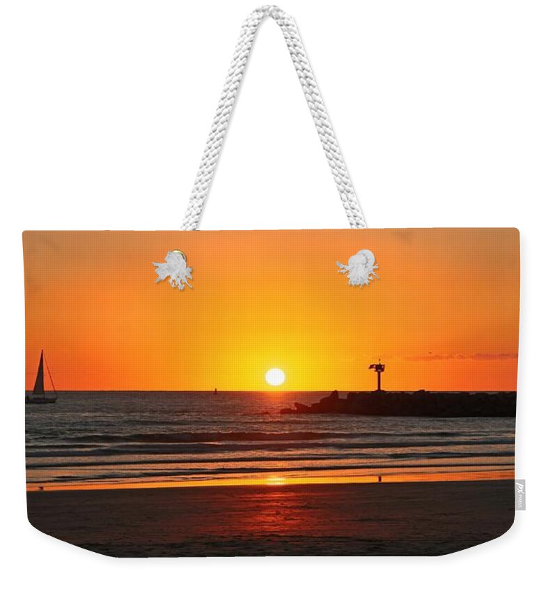 Ocean Sunset Weekender Tote Bag featuring the photograph Serene Ocean Sunset by Christy Pooschke
