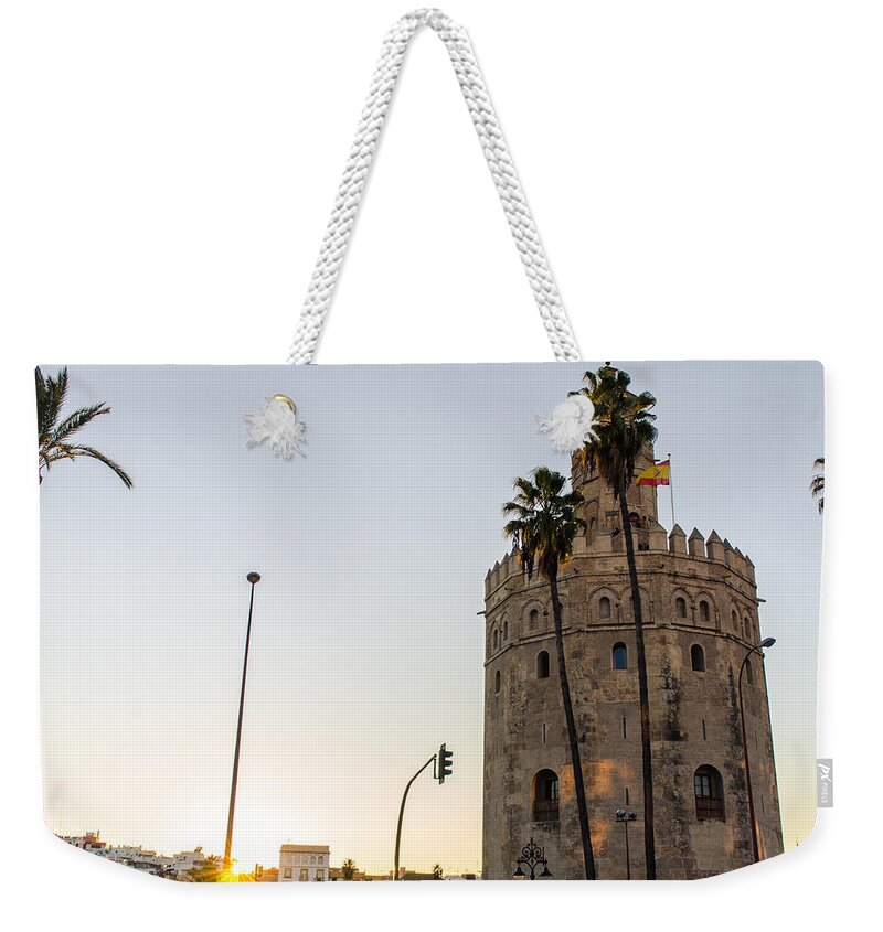 Seville Weekender Tote Bag featuring the photograph Seville - Torre del oro at sunset by AM FineArtPrints