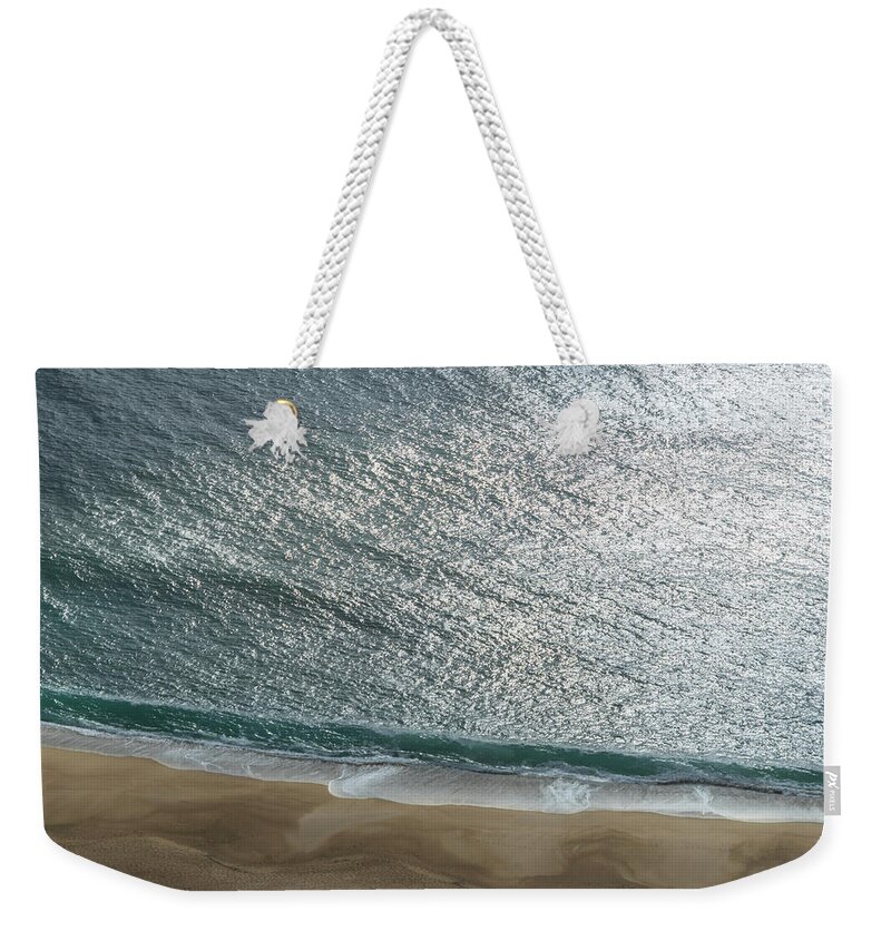 Shimmering Fluid Weekender Tote Bag featuring the photograph Shimmering Fluid Solitude by Georgia Mizuleva