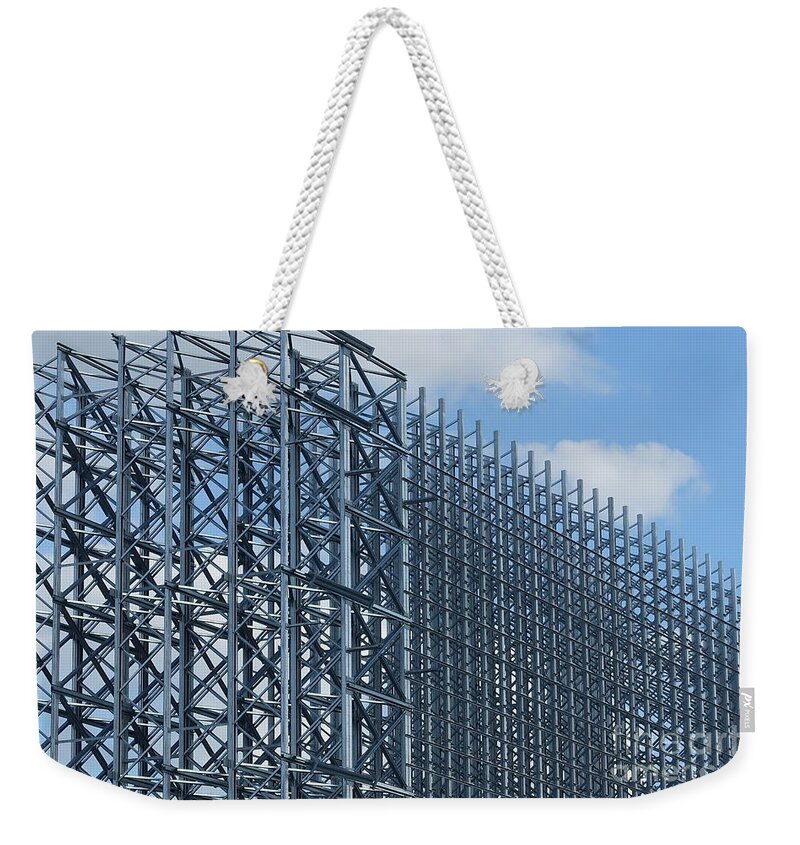 Steel Construction Weekender Tote Bag featuring the photograph Shiny Steel Construction in Nature by Eva-Maria Di Bella