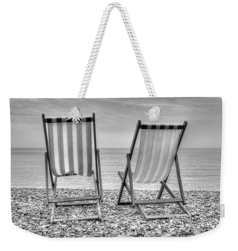 Deckchairs Weekender Tote Bag featuring the photograph Shore Seats by Hazy Apple