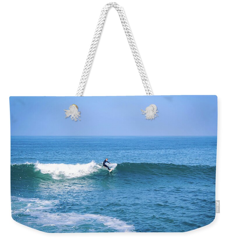 Surfer Weekender Tote Bag featuring the photograph Shredder by Alison Frank