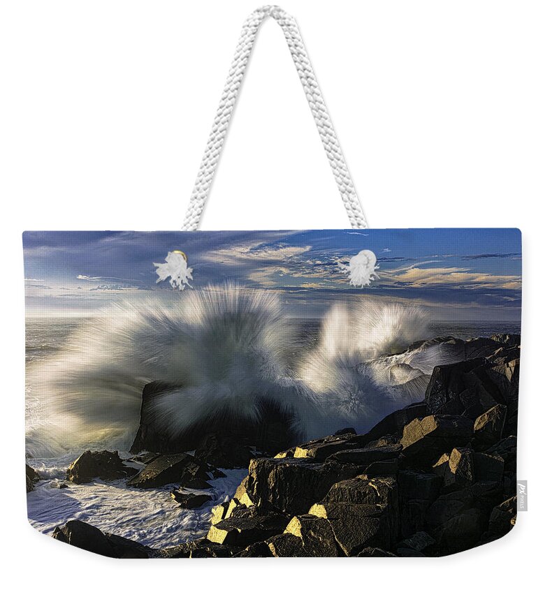 Quoddy Weekender Tote Bag featuring the photograph Side Lit Wave Crashes Ashore at Quoddy Boldcoast by Marty Saccone