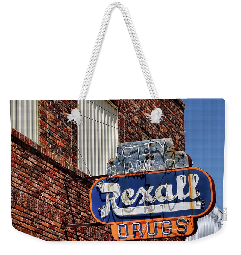 Advertising Weekender Tote Bag featuring the photograph Sign of the Past by David and Carol Kelly
