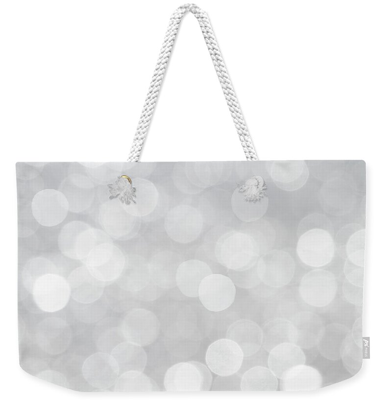 Bokeh Weekender Tote Bag featuring the photograph Silver Grey Bokeh Abstract by Peggy Collins