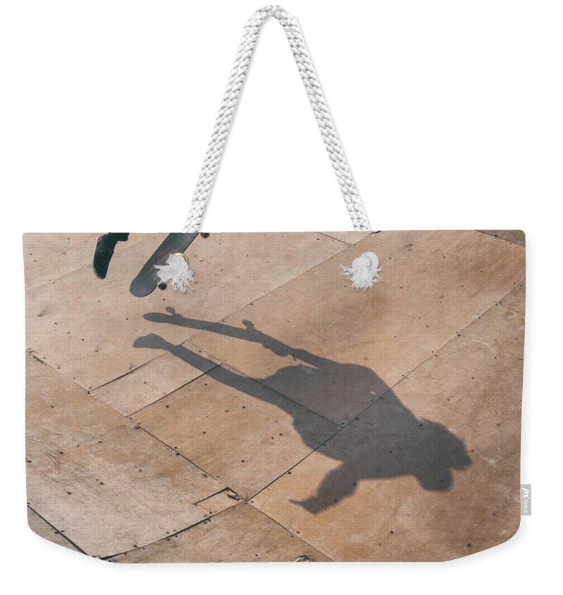 Skate Weekender Tote Bag featuring the photograph Skater Boy 001 by Clayton Bastiani