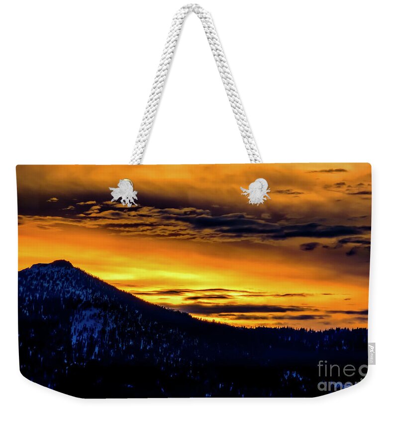 Sky Fire Weekender Tote Bag featuring the photograph Sky Fire by Mitch Shindelbower