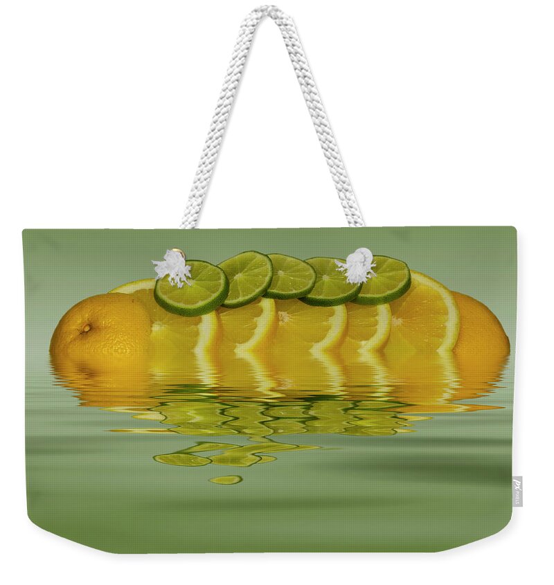Fresh Fruit Weekender Tote Bag featuring the photograph Slices Orange Lime Citrus Fruit by David French