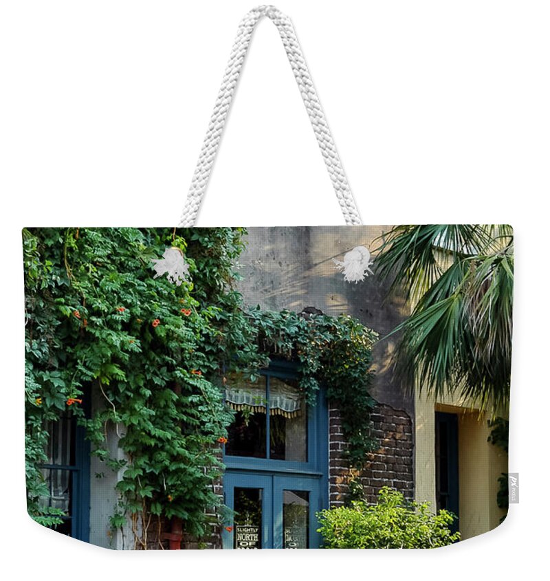 Slightly North Of The Broad Restaurant Weekender Tote Bag featuring the photograph Slightly North of the Broad by Bob Phillips
