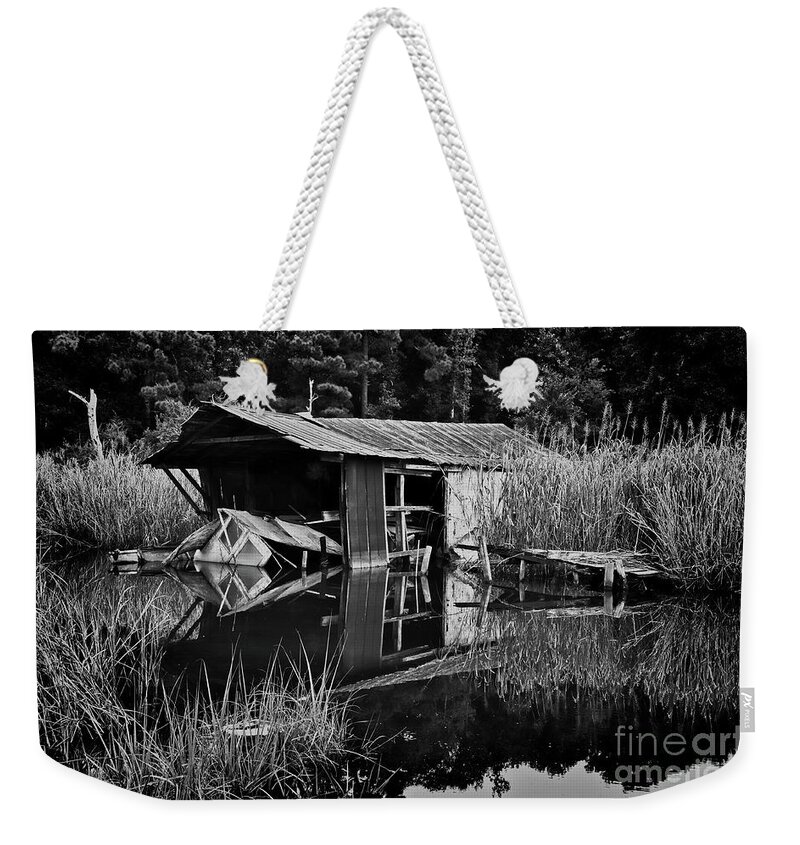 Boat Weekender Tote Bag featuring the photograph Slipping Away by Randy Rogers