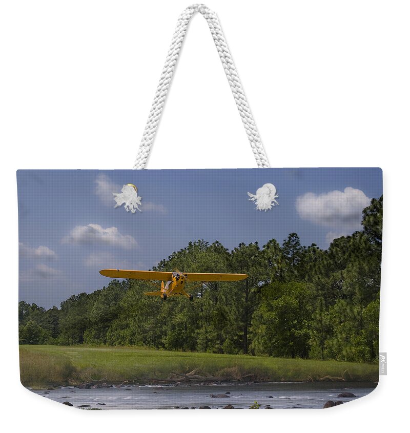 Cub Weekender Tote Bag featuring the photograph Slow And Low by Steven Richardson