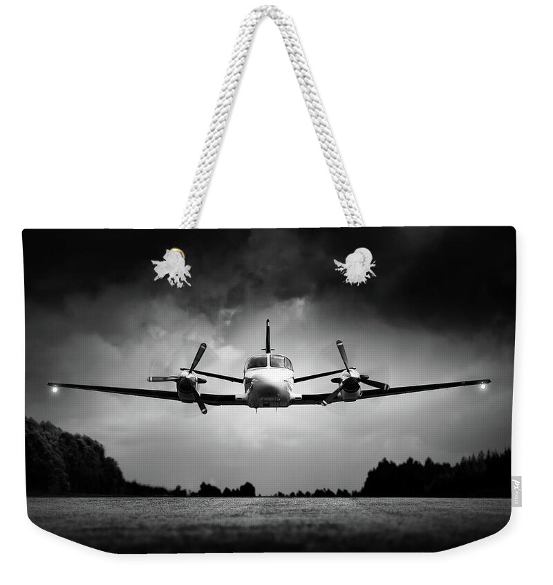 Airplane Weekender Tote Bag featuring the photograph Small airplane low flyby by Johan Swanepoel