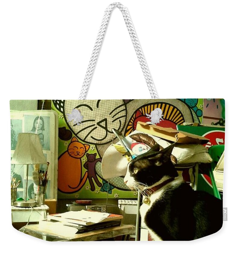 Cat Weekender Tote Bag featuring the photograph Smell To Fight by Sukalya Chearanantana